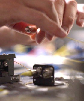 A closeup of a technician adjusting a lead